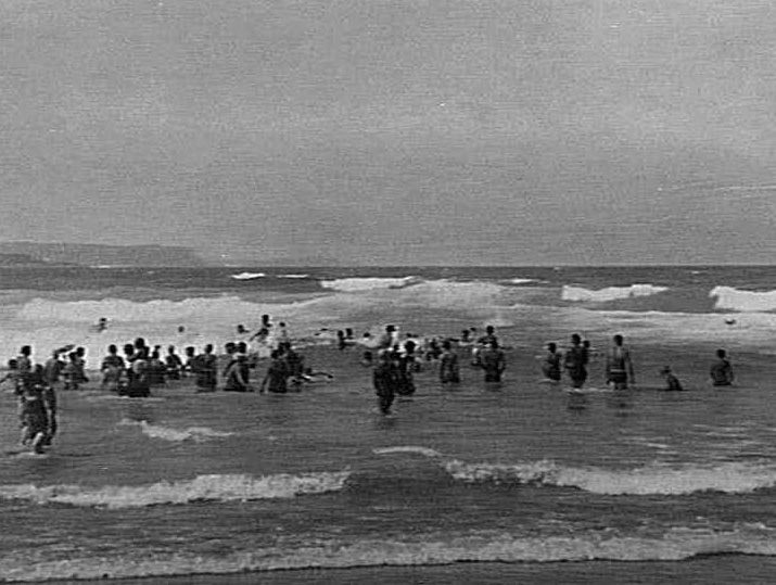 Swimmers in the water at Manly Beach