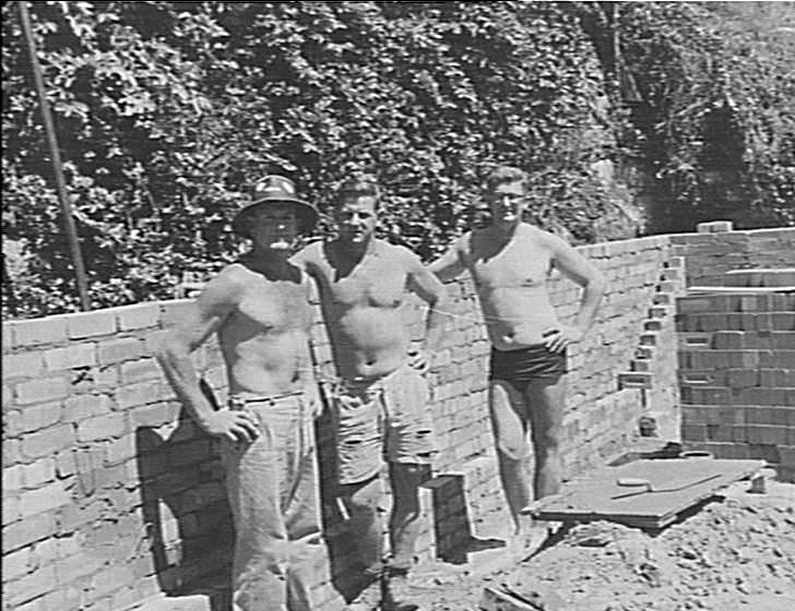Men constructing a building near Manly Cove Saling Clubs