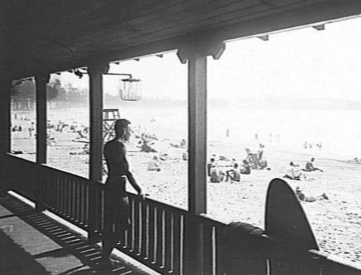 Part of the verandah of Manly Surf Pavilion, and Manly Beach