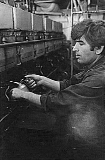 Mechanic in the engine-room of a Manly Ferry, 1983