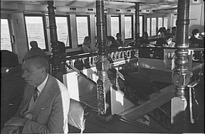 Passengers on a Manly Ferry, showing the ferry's interior