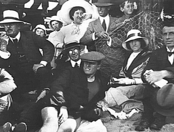 Crowd of people sitting on Manly Beach, c1910