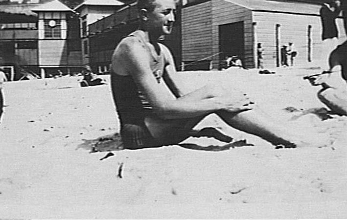 George Pike, member Manly Surf Club, at Manly Beach, c 1920