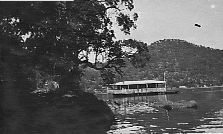 Houseboat on Cowan Creek, c 1920