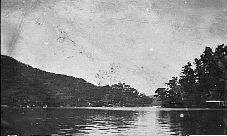 View along Cowan Creek, shows houseboats and bushland, c 1920