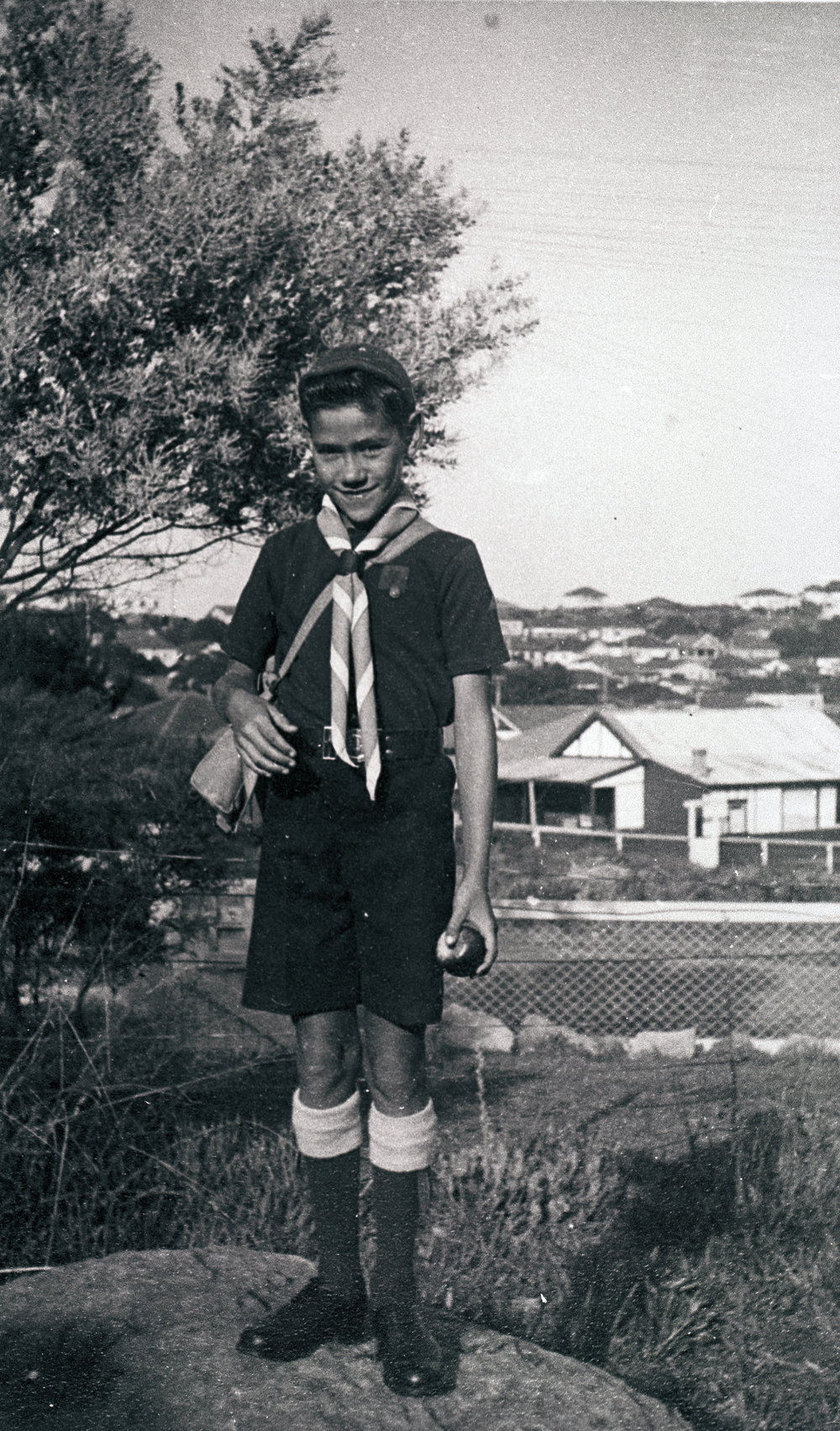 John Short, 3rd Manly Cubs, standing in Monash Parade, Dee Why