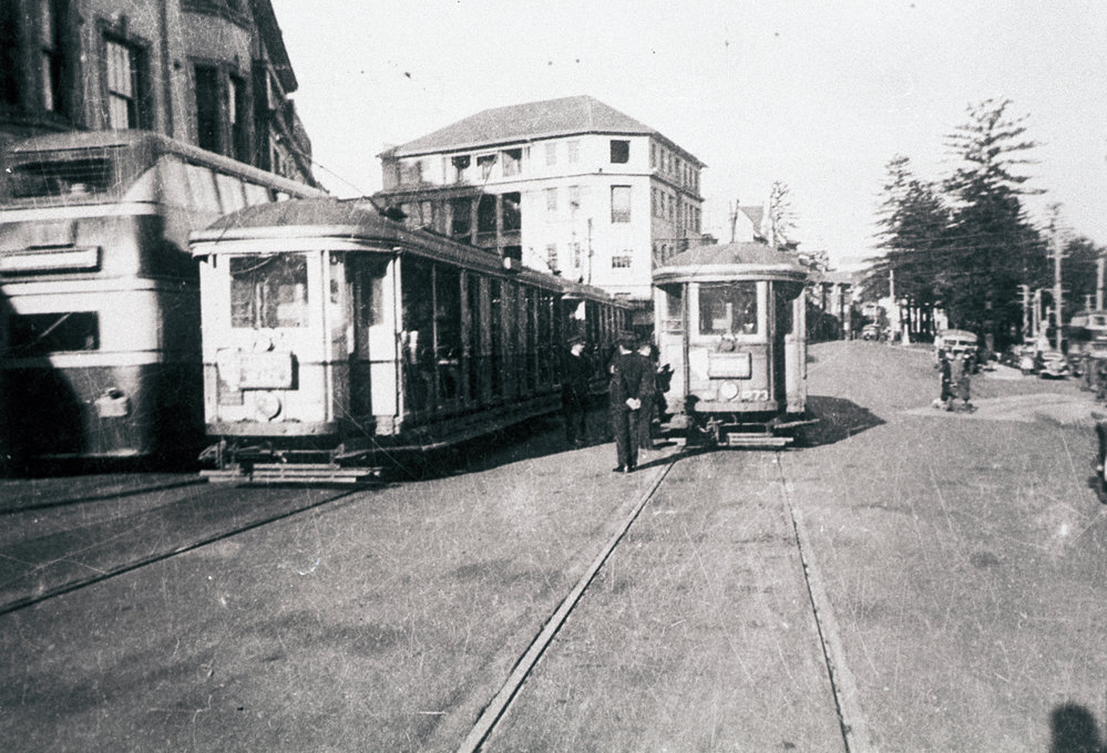 Trams and bus, corner Belgrave Street and West Esplanade