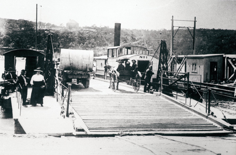 The Spit Punt being loaded with a truck and a dray