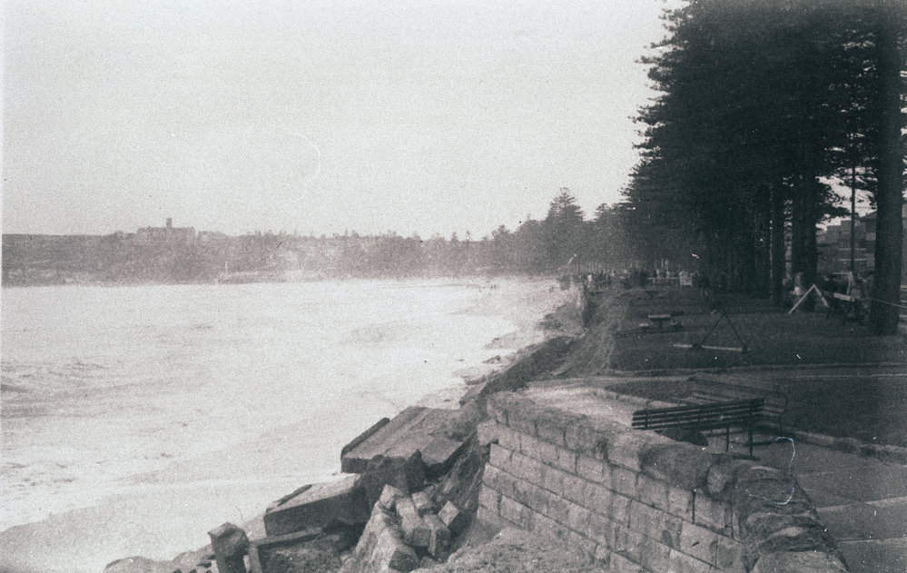 Damaged sea wall at Queenscliff Beach following a storm