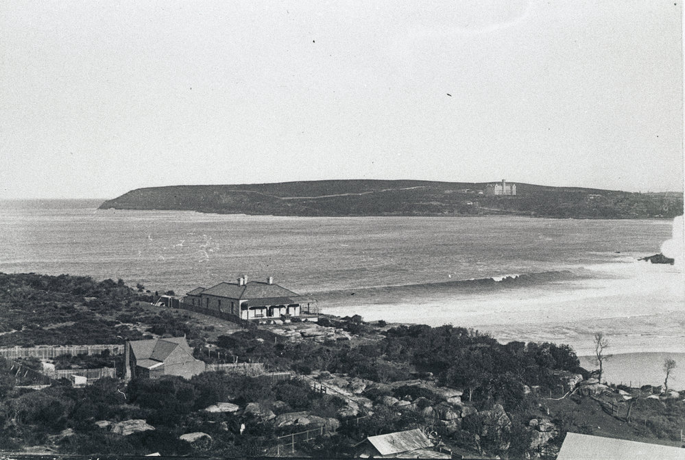 View south across Freshwater Beach to North Head showing Pacific Hotel