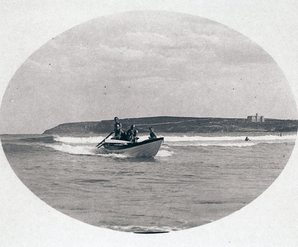 Surf boat in action at Freshwater Beach