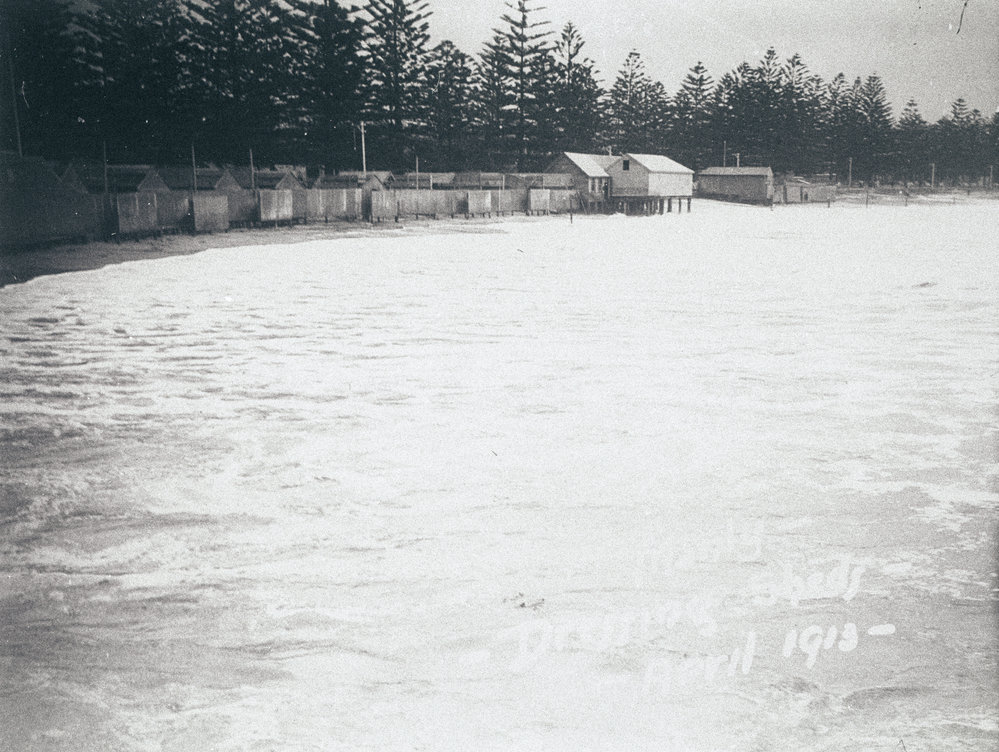 Dressing sheds on Manly Beach during high seas