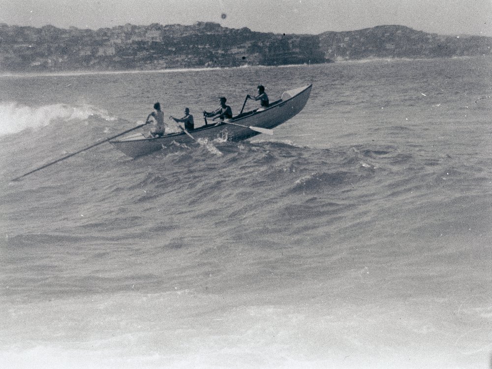 Surf boat in action at Manly Beach