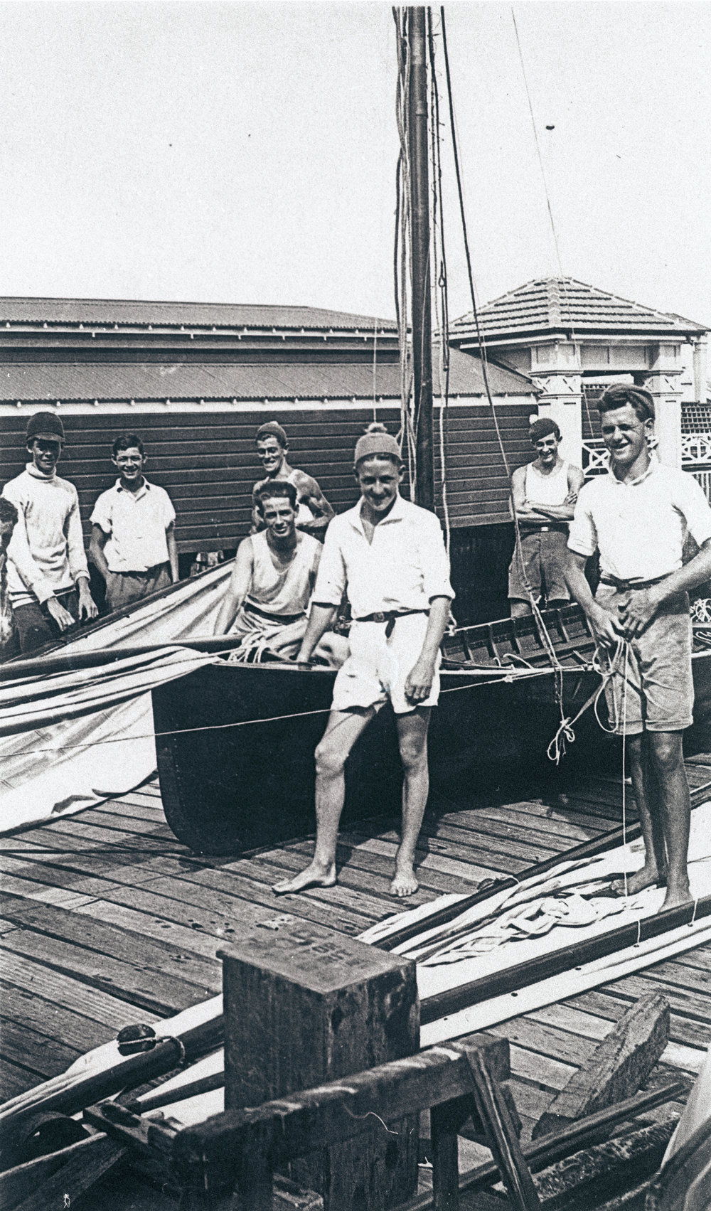 Members of Manly 16ft Skiff Club with skiff