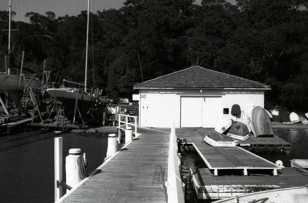 Sea Scout Boatshed, and slipways of Davis's Marina, North Harbour
