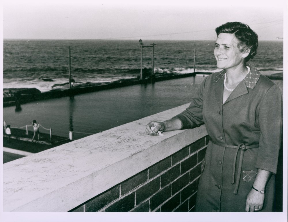 Isa Wye on roof of men's changing sheds Dee Why rock pool