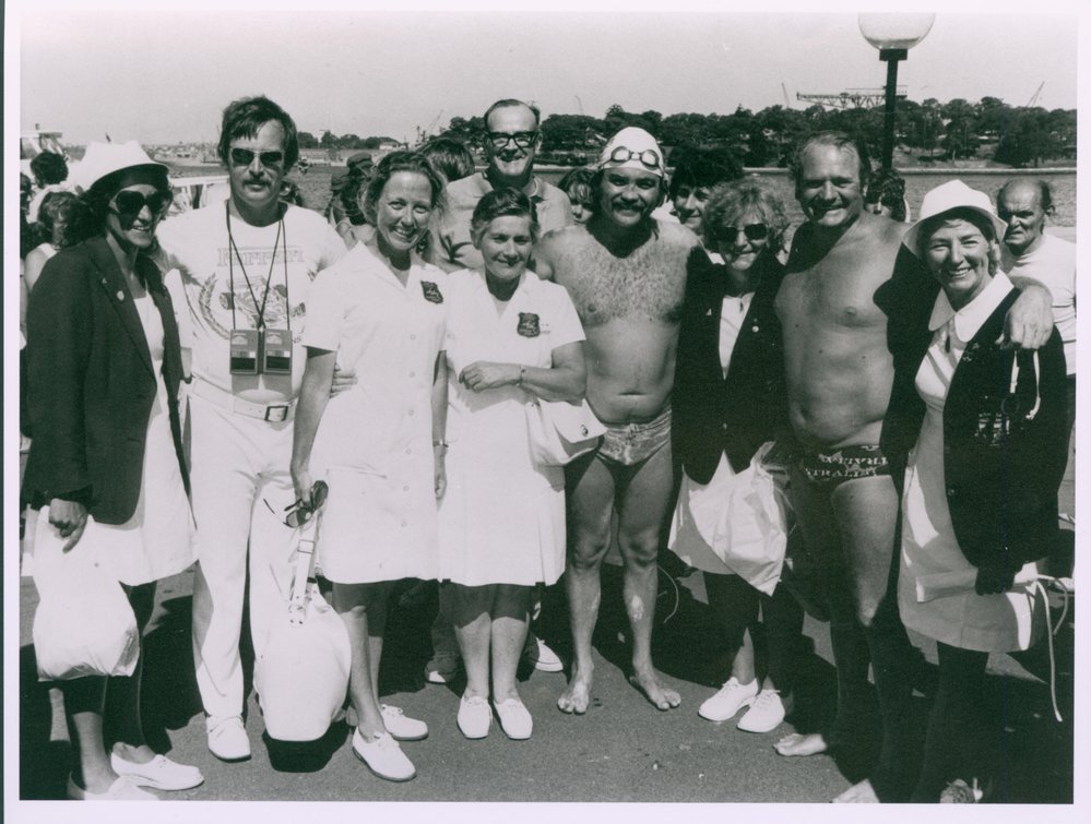 Isa Wye, Officials &amp; competitors harbour swim Manly Wharf to Man-O-War steps 8 Jan 1977