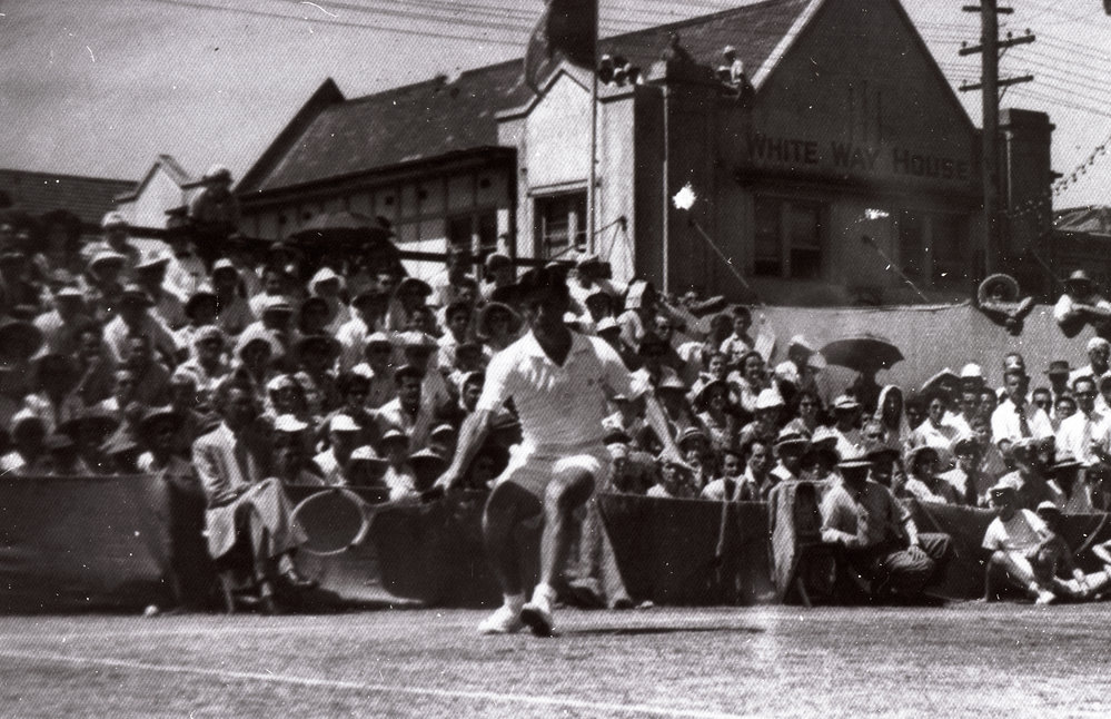 Unidentified man playing tennis