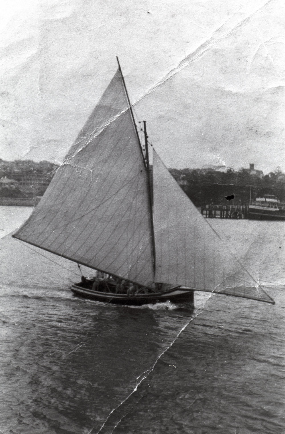 Canvas skinned 18 Foot skiff in Manly Cove