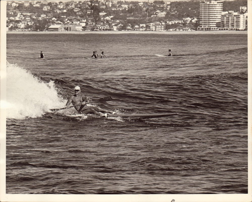 C.J. "Snowy" McAlister surfing at North Narrabeen, 1970s