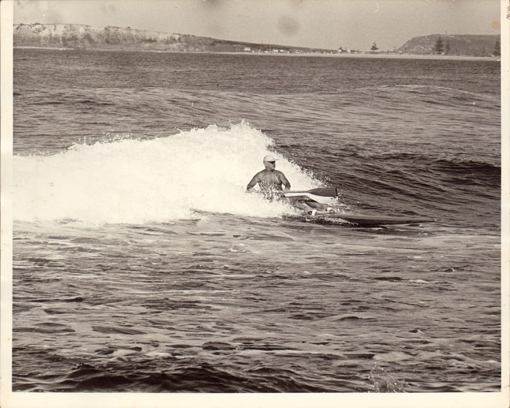 C.J. "Snowy" McAlister surfing at North Narrabeen, 1970s