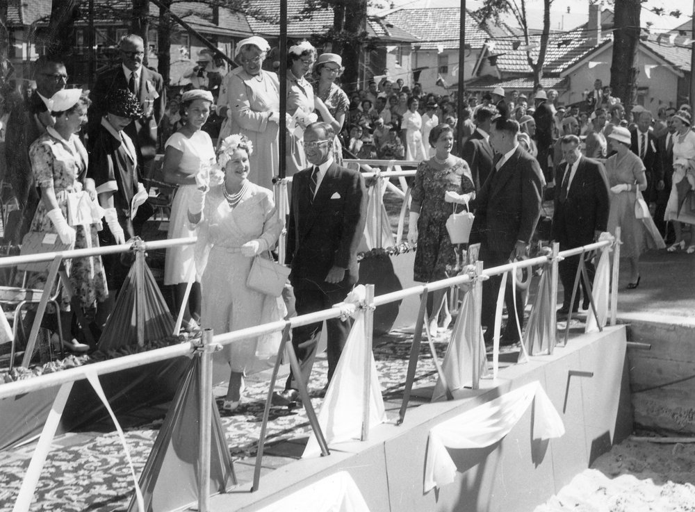 Queen Mother being escorted by Judge Adrian Curlewis, 1958