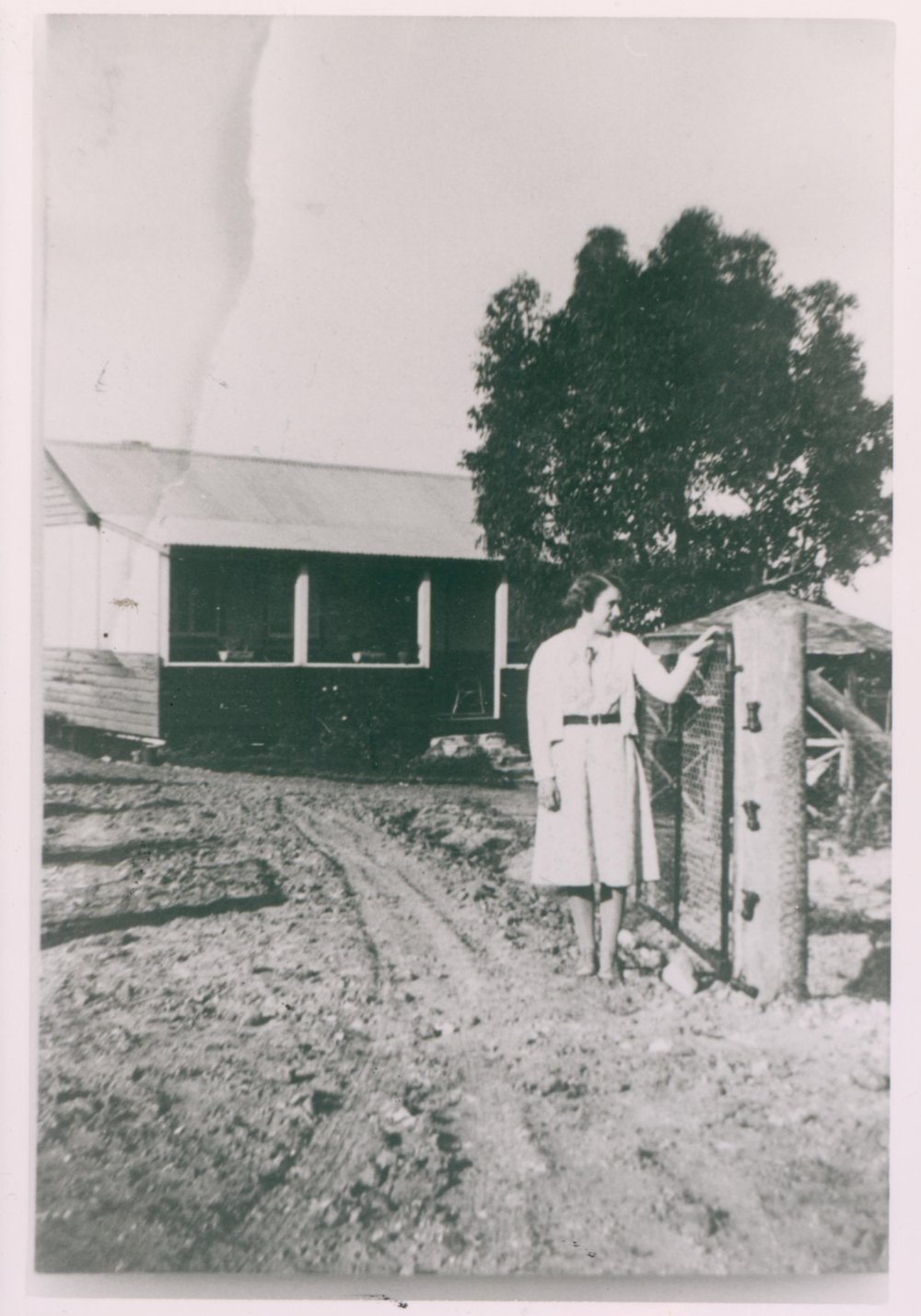 Pat Grimshaw outside her parents' home, Terrey Hills