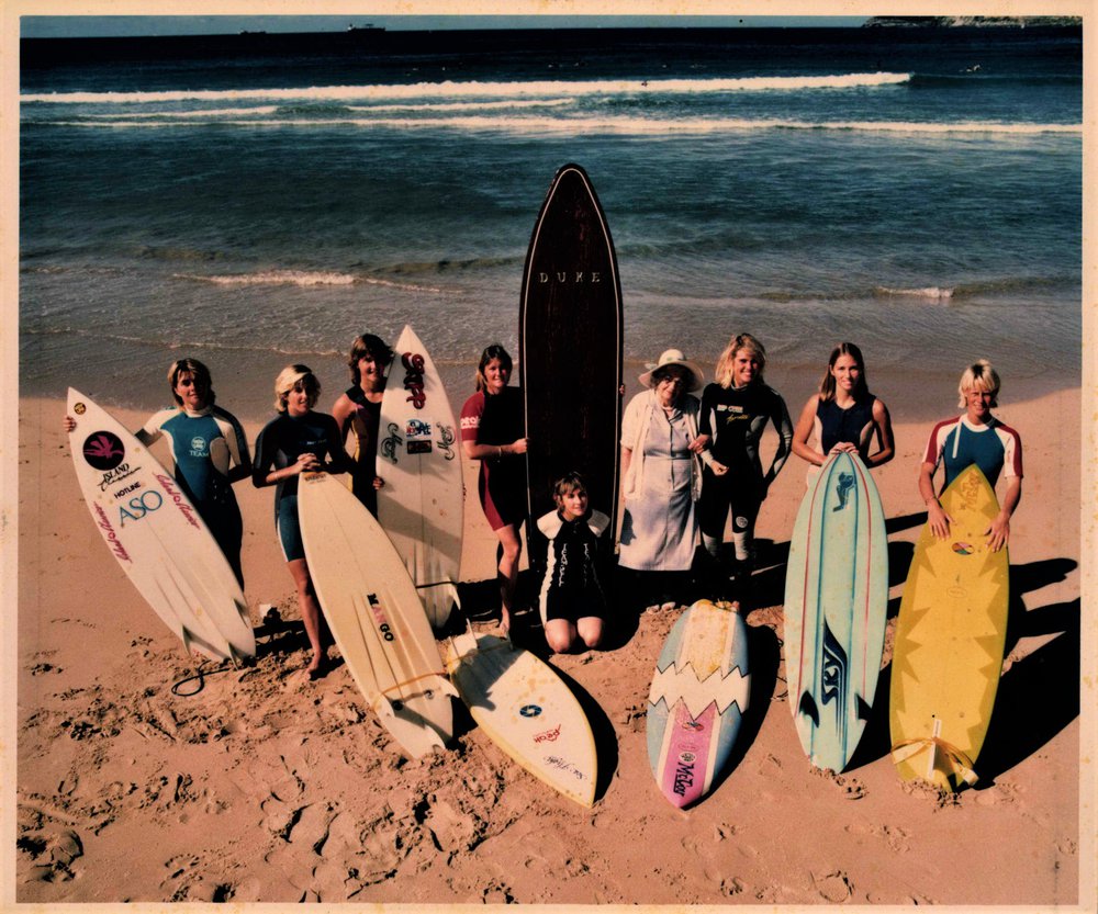 Isabel Letham with female surfers, Freshwater 
