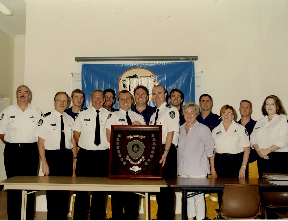 Davidson Rural Fire Brigade Members with shield