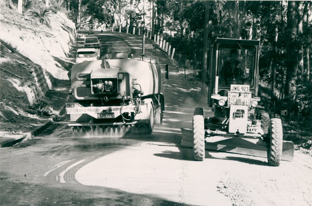 Water tanker and grader working on Nioka Road Narrabeen