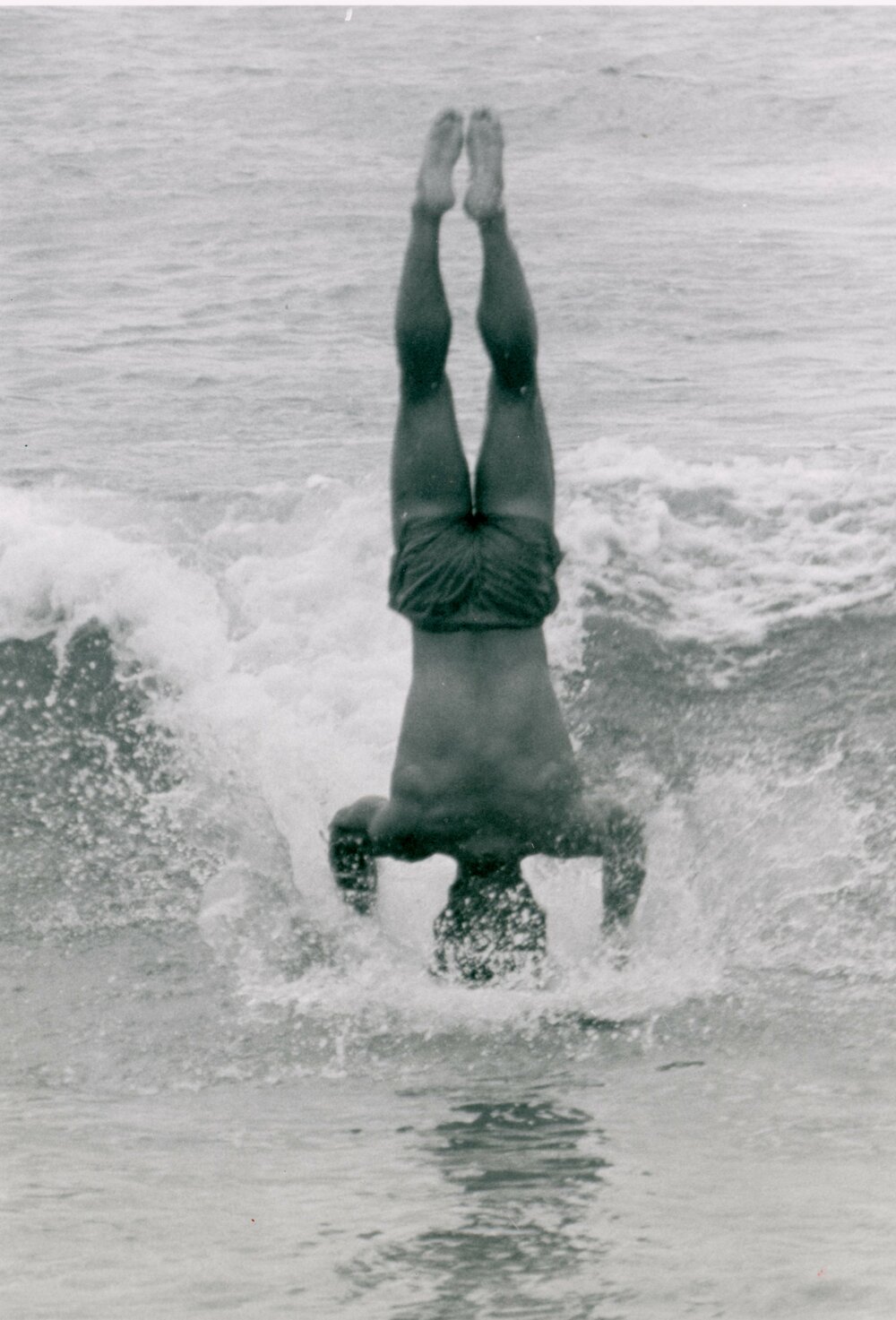 Handstand while surfing