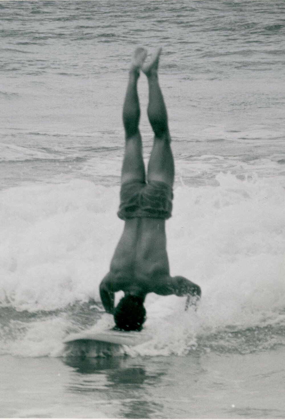 Handstand while surfing