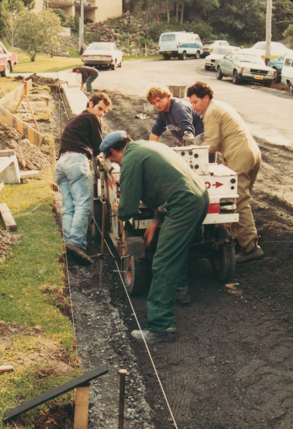 Warringah Council Workers laying kerbing and guttering