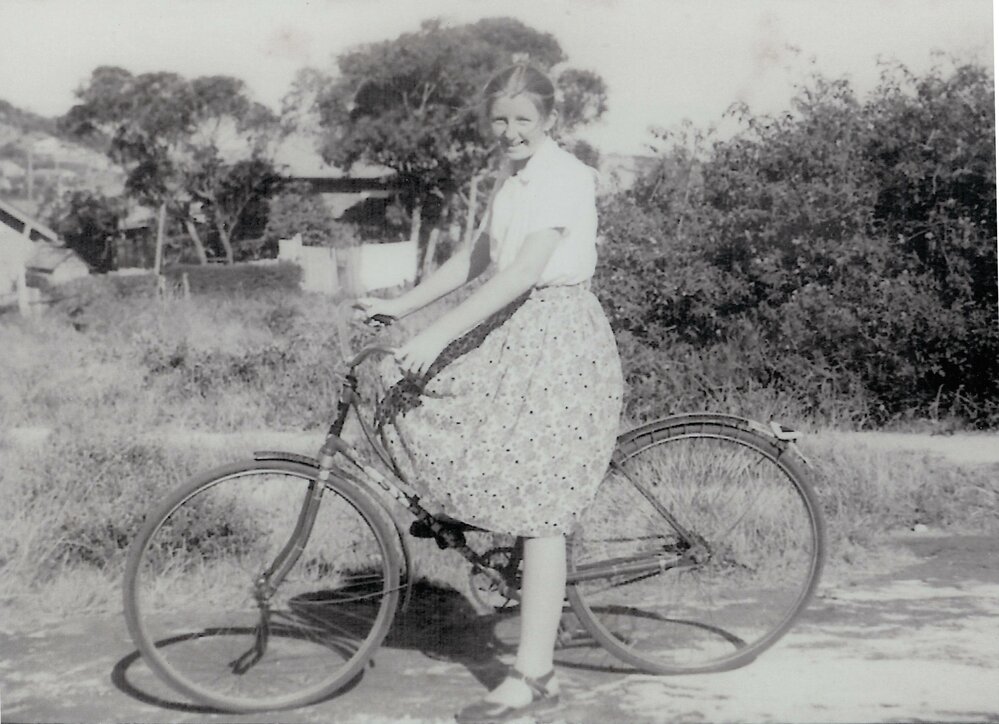 Miss Goss on bicycle, Harbord