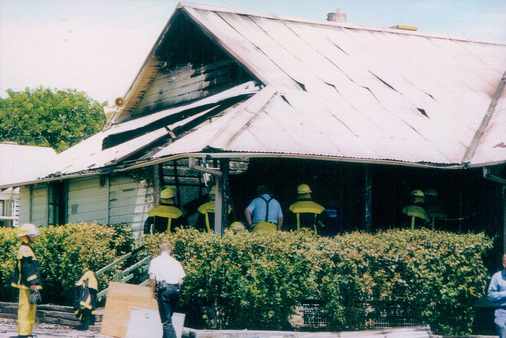 Firemen inspecting original Harbord Public School building after the fire