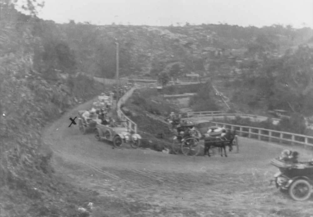 Cars and horse drawn vehicles on the hairpin turns to the punt at The Spit