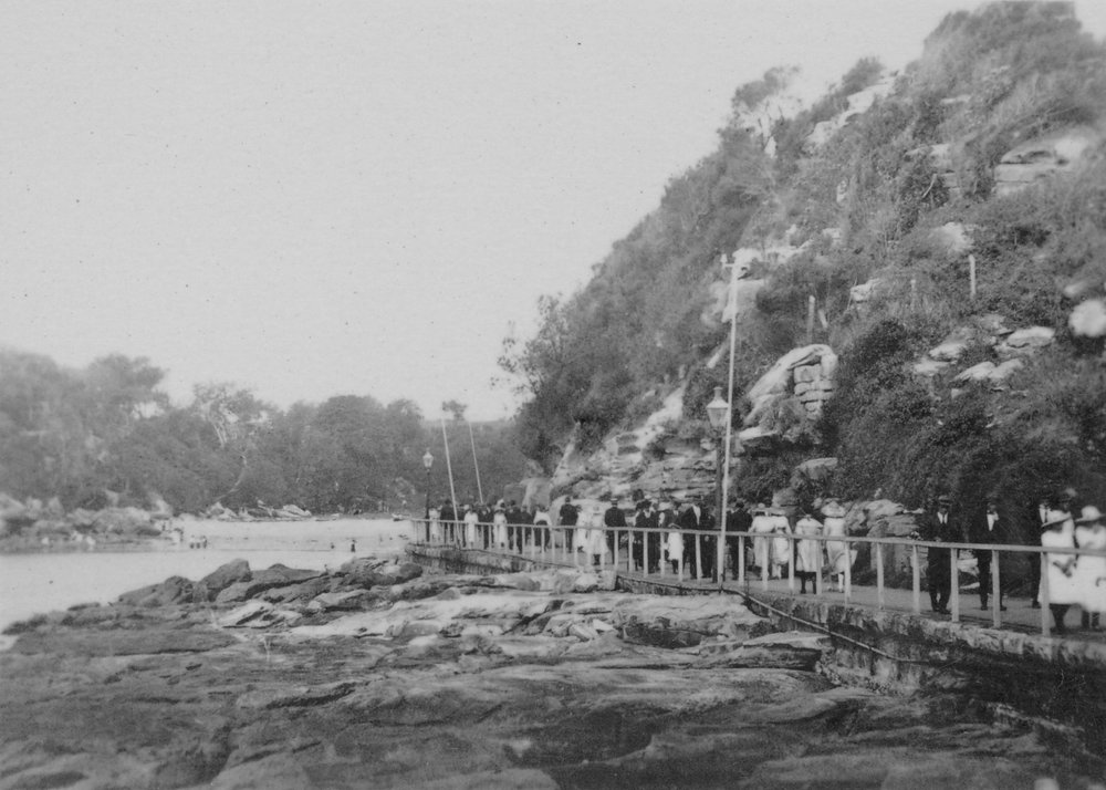 Crowds walk along the Fairy Bower Walkway to Shelly Beach, Manly, c1920s