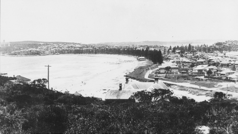 Elevated view south from Queenscliff, showing sweeping views of Manly Beach, c1920s