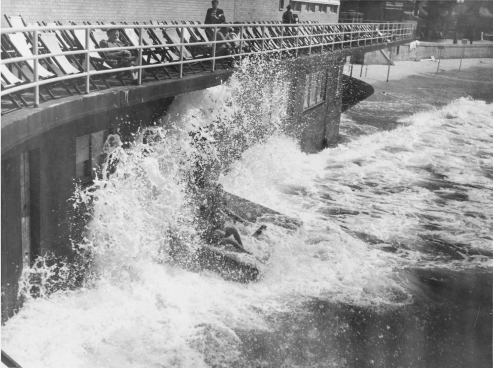 Waves breaking against the wall of Manly Surf Pavilion, Manly, c1940s