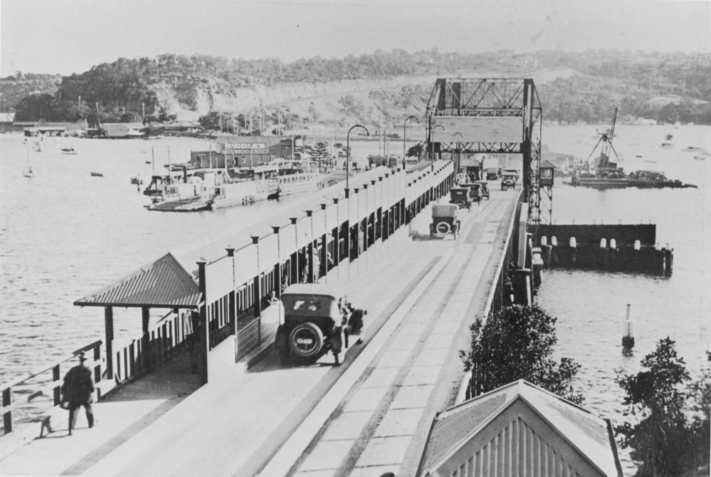 Cars and people crossing the first Spit Bridge, c1927