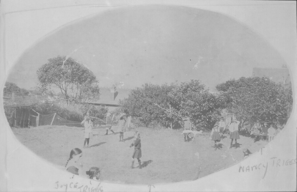 Children playing in a yard at an unidentified location, c1940s