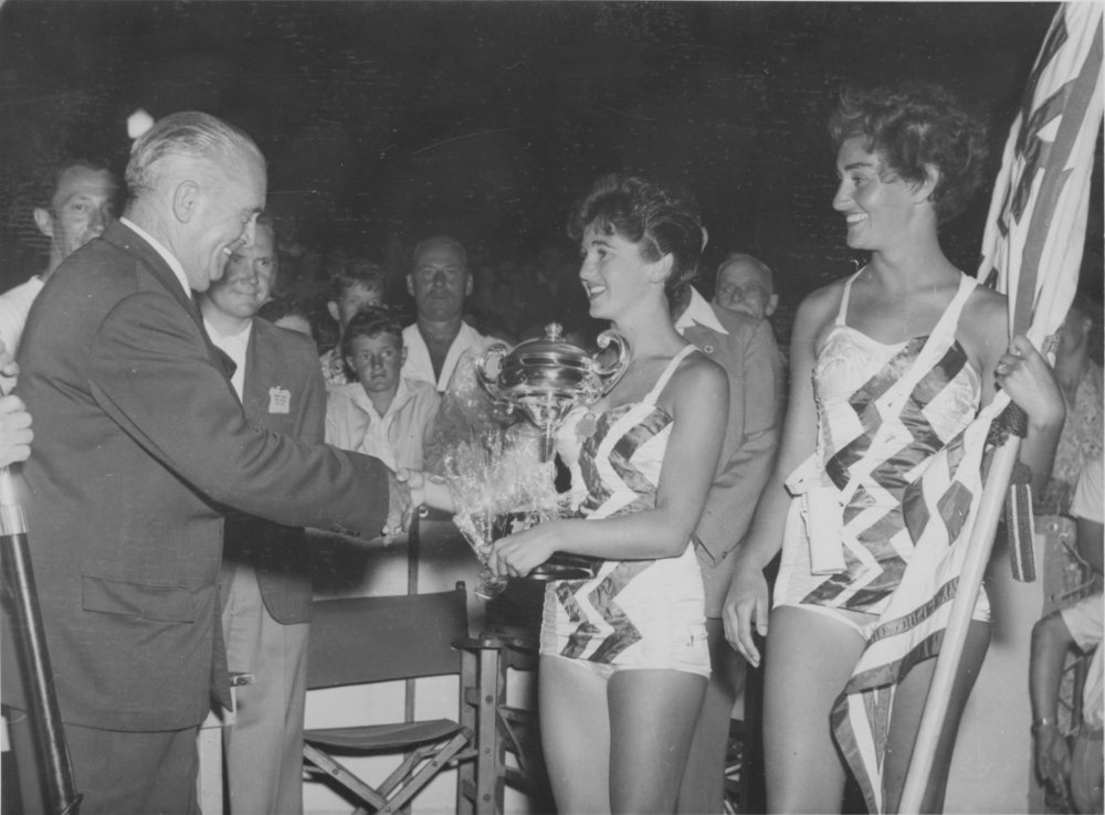 Sir Robert Askin presenting a trophy to two girls in costume, October 13, 1982