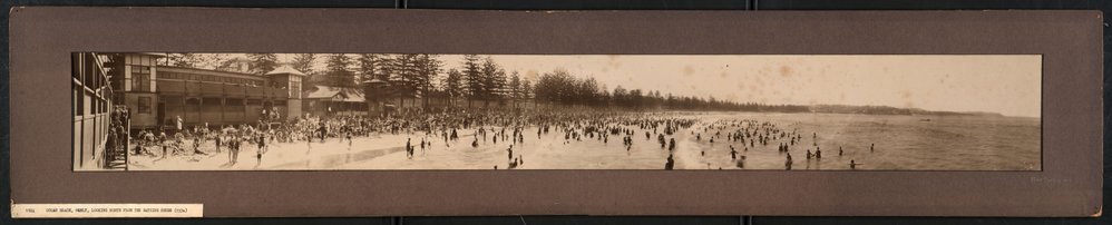 Panoramic view looking north from the changing sheds, of beach-goers at Manly Beach, Manly, 1924