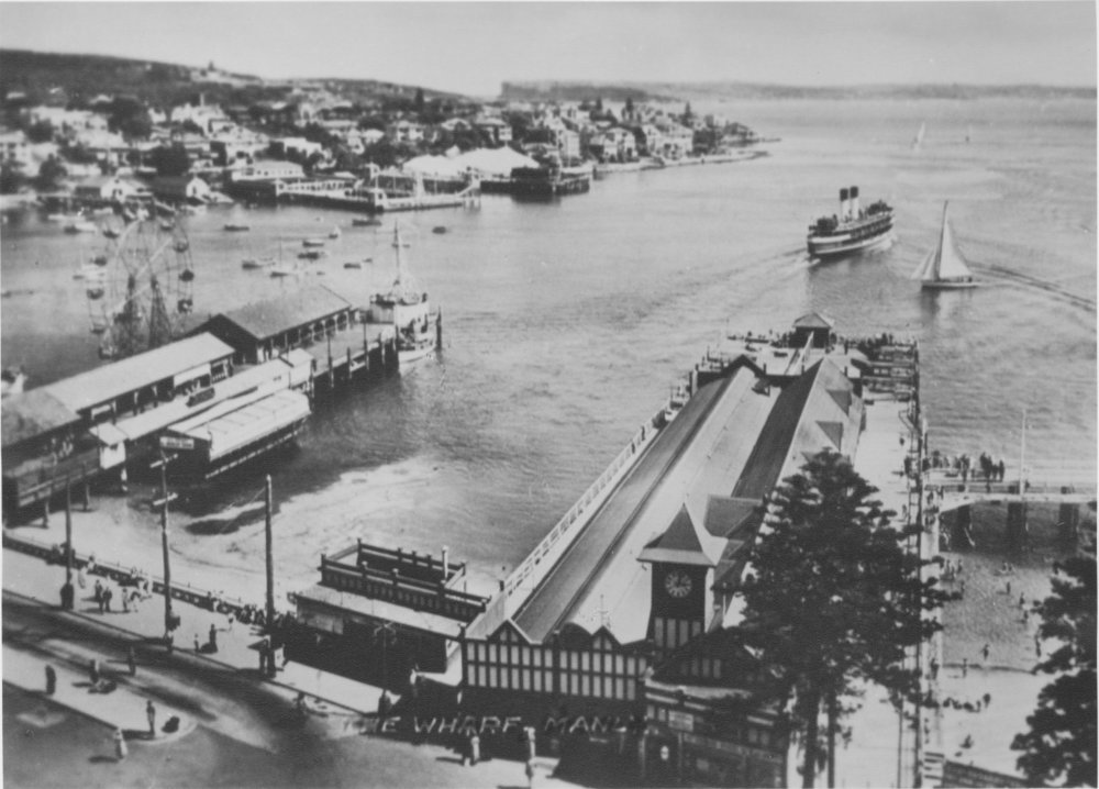 View facing south, showing Manly Wharf, Manly Fun Pier, a Manly Beach Steamer and boats, Manly, c1930s