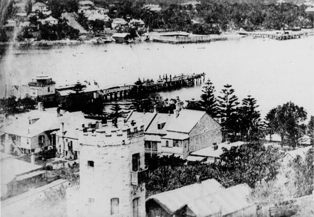 Manly Wharf, Manly Cove, Baths, Coal Wharf and the stone tower Camera Obscura, c1890s