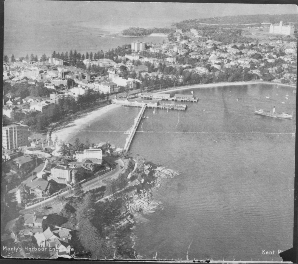 View of Manly Cove, Harbour Pool, Wharf, ocean and St Patrick's College, Manly, c1930s