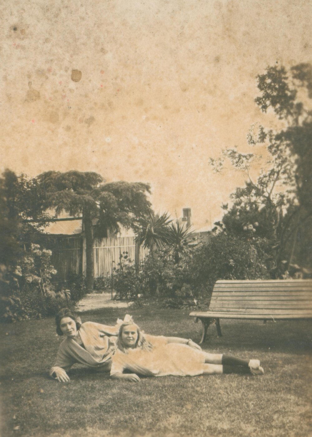 Posing by the Garden Bench