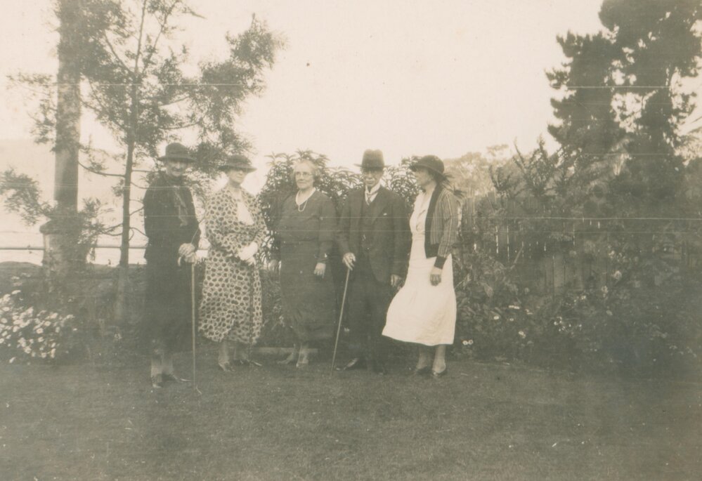 Ireland family in front garden of Koala House, Bayview.