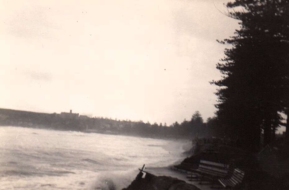 View south, showing the North Steyne sea wall damaged by a storm, Manly, 1950