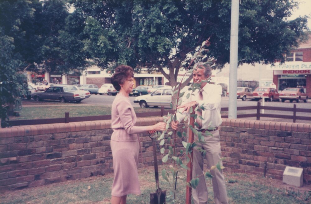 Olive Beaton and Shire President Paul Couvret planting a tree for the 10th anniversary of Mona Vale Library 